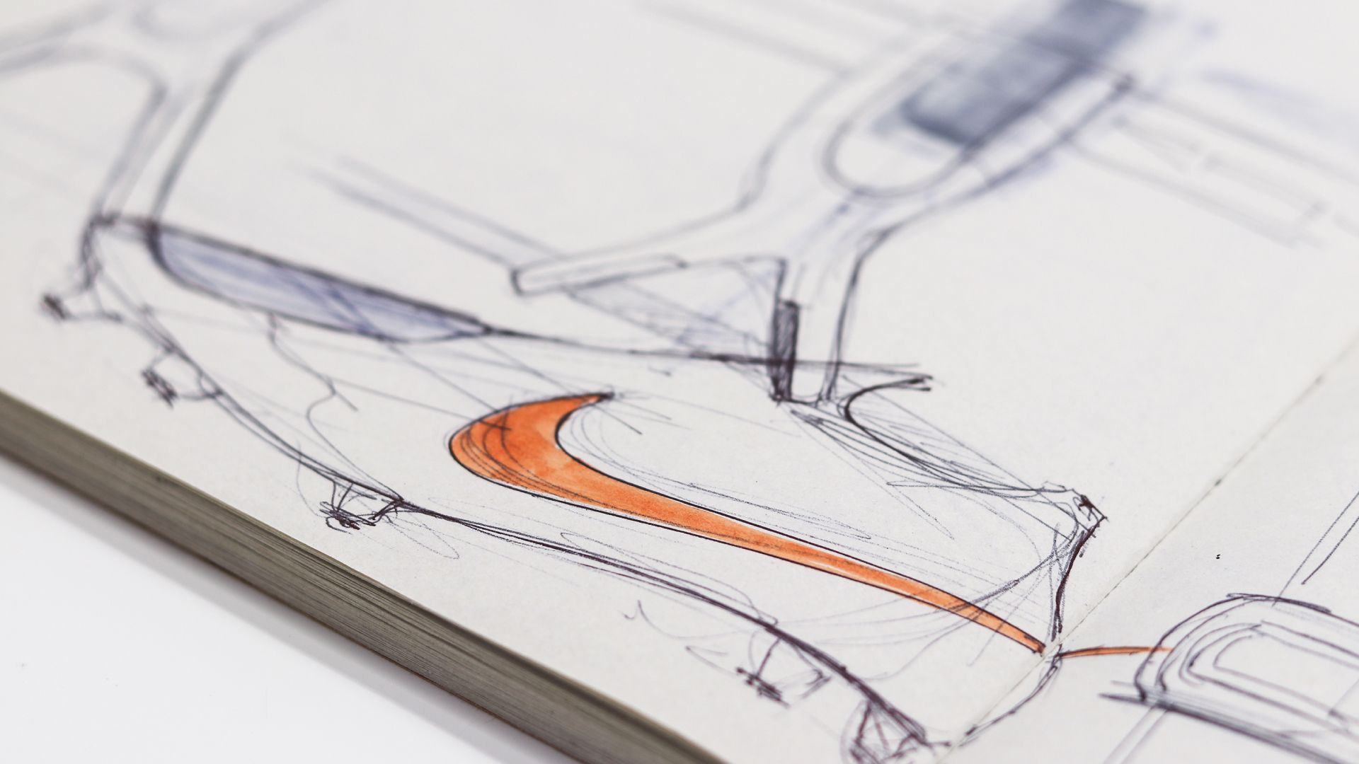 Sketchbook page with refined Rayzor concept sketches and orange highlights.